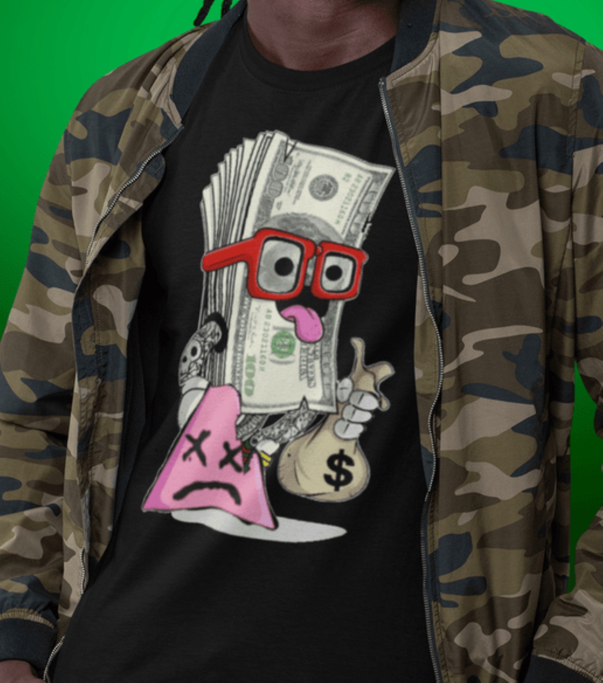 Person wearing a black t-shirt with a graphic design of money, glasses, and a bag, with a camouflage jacket on a green background.
