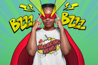 A person wearing a red superhero mask and cape over a white graphic T-shirt, posing with fingers near their eyes against a bright green comic-style background with yellow 'BZZZZ' text and 'BREAKING NEWS!' artwork.