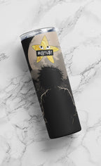 Tumbler with star design and text on a marble surface