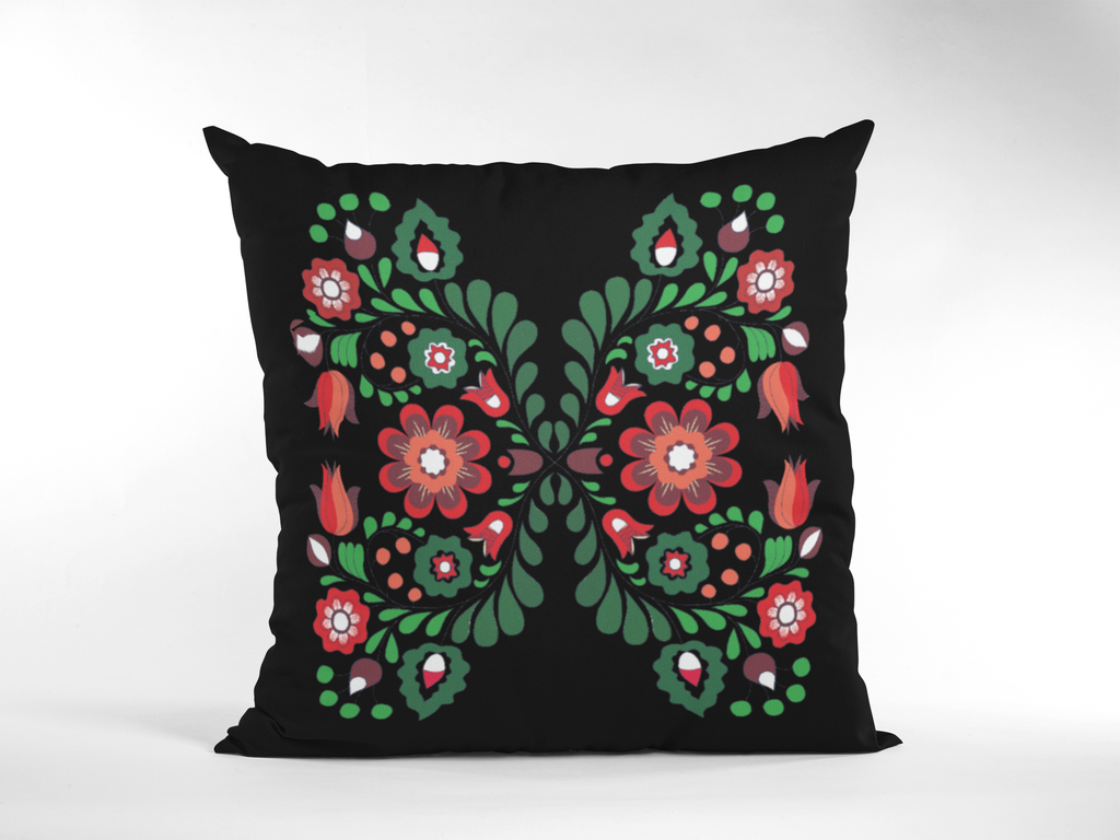 Decorative pillow with floral pattern on a black background