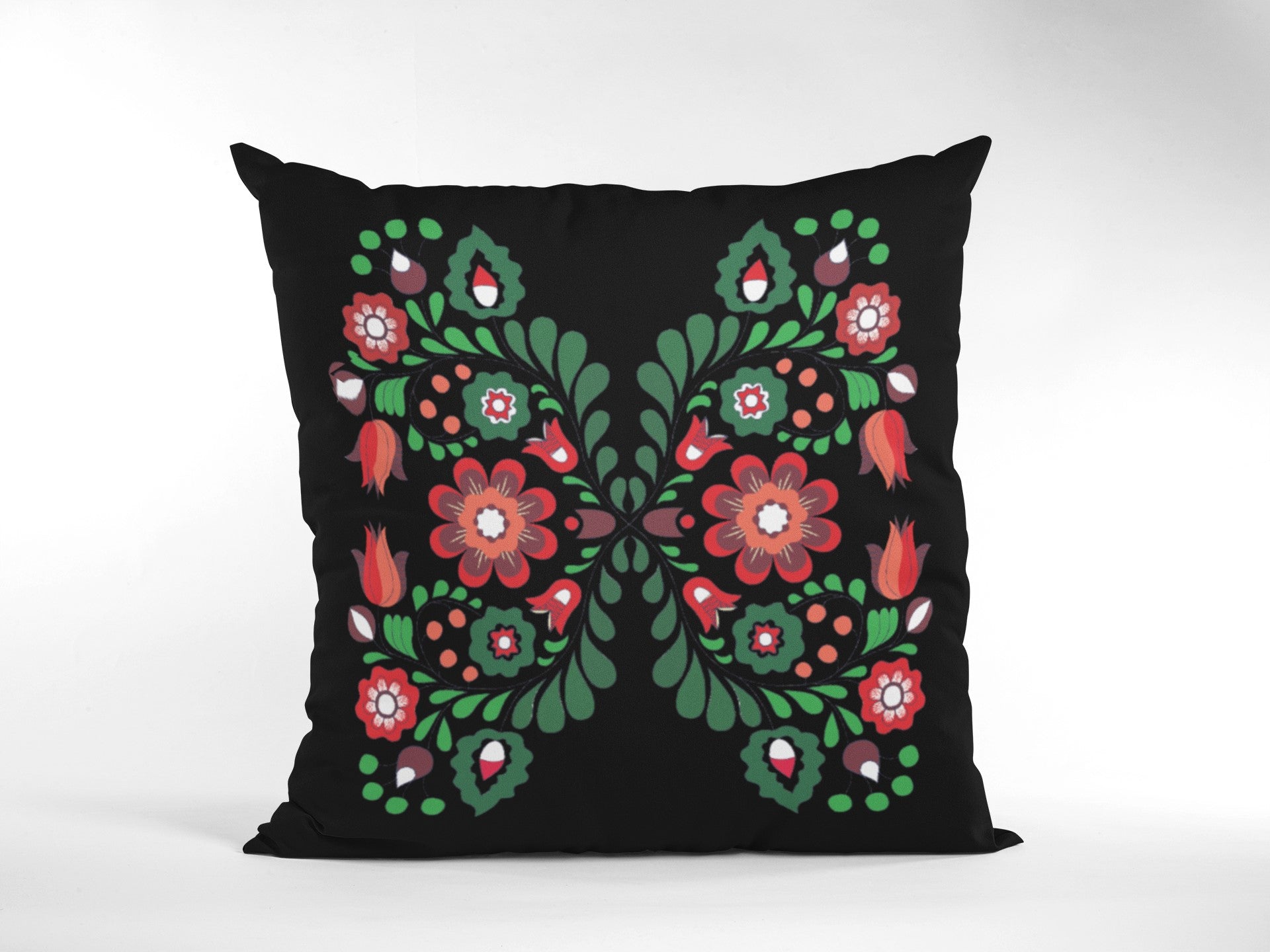 Decorative pillow with floral pattern on a black background
