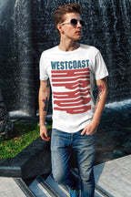 Person wearing a 'Westcoast' t-shirt standing in front of a water fountain.