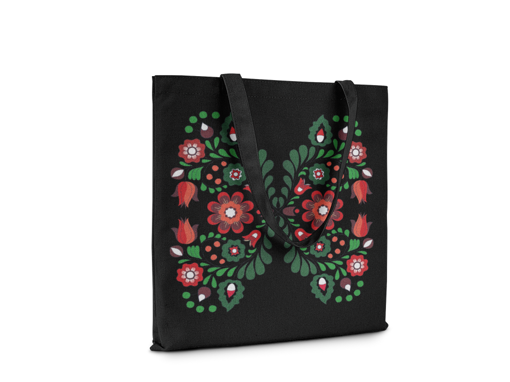 Black tote bag with colorful floral design on a white background