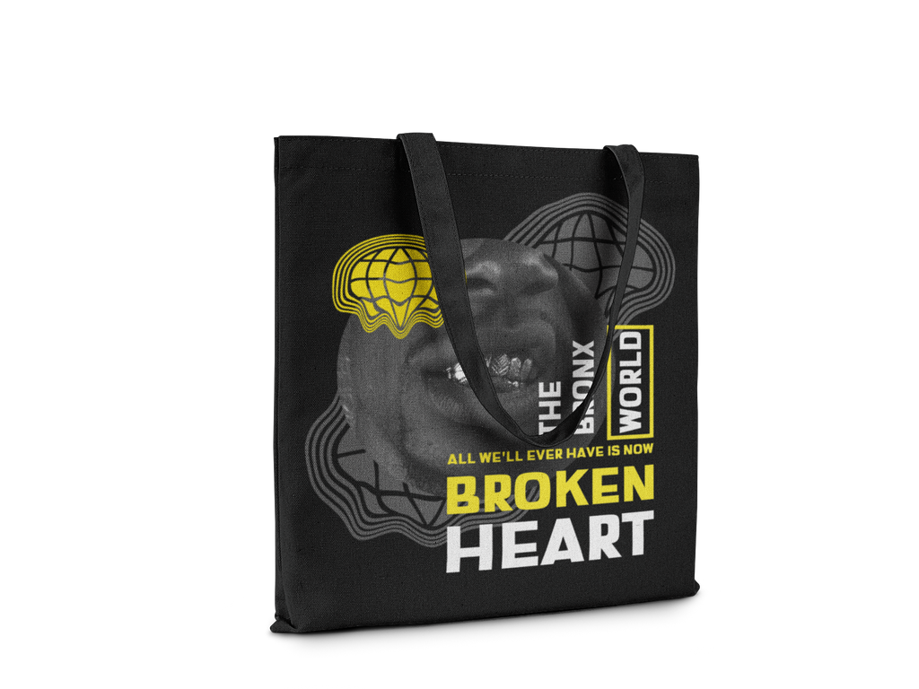 Black tote bag with graphic design and text on a white background