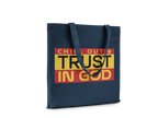 Navy blue tote bag with 'Chill Out & Trust In God' text in yellow and red on a white background