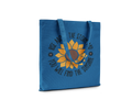 Blue tote bag with sunflower design and motivational quote on a white background