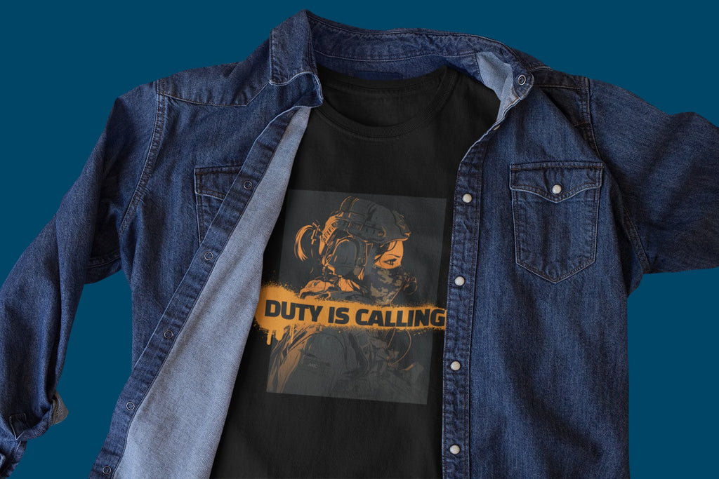 Black t-shirt with 'Duty is Calling' graphic under a denim jacket on a blue background