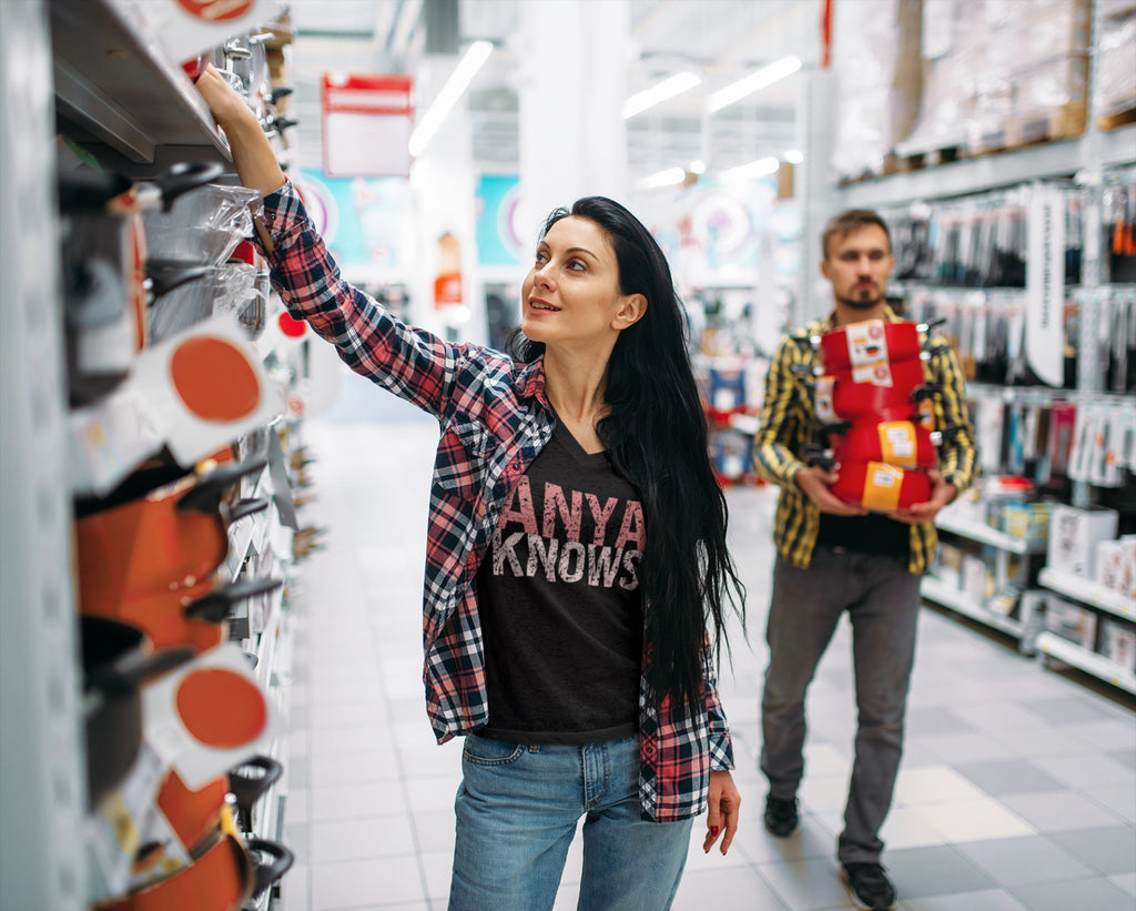 Woman shopping in a store with a man in the background
